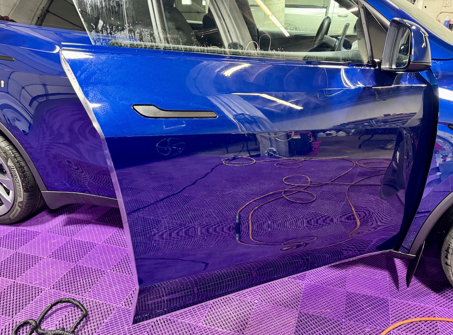 Blue luxury vehicle protected by STL Auto Defenders