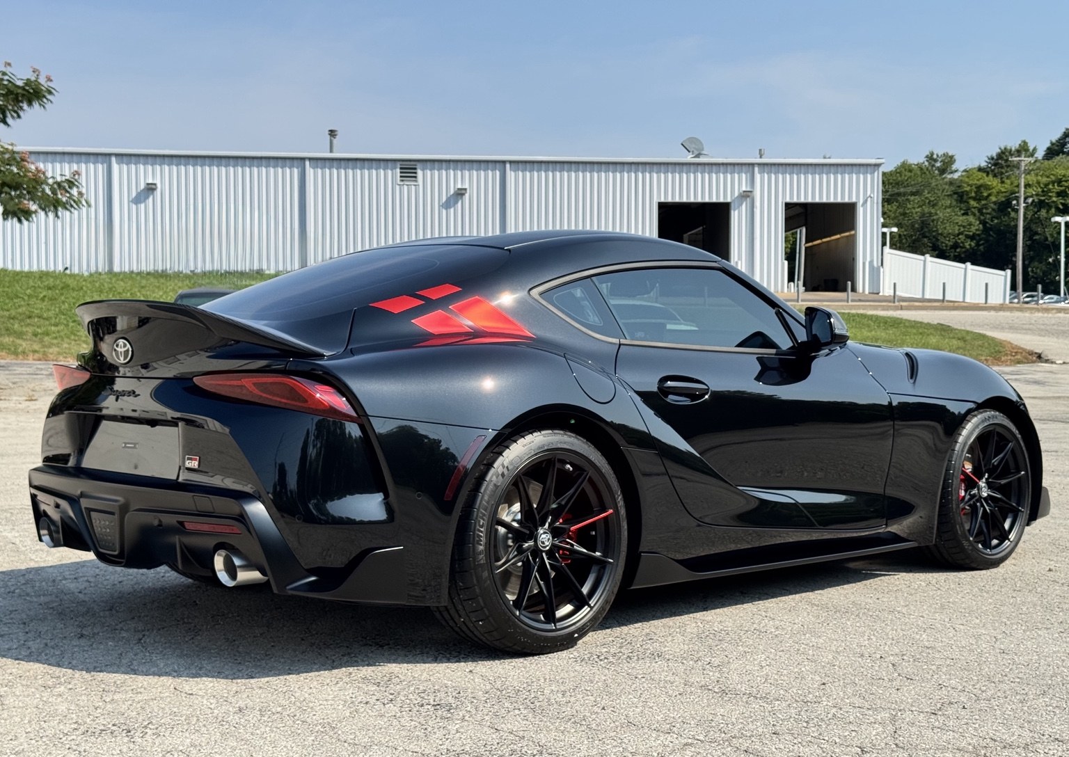 Black Toyota Supra featured on STL Auto Defenders' ceramic coating page