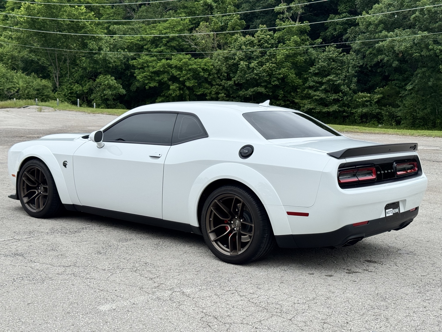 White Dodge Challenger protected in Arnold Missouri
