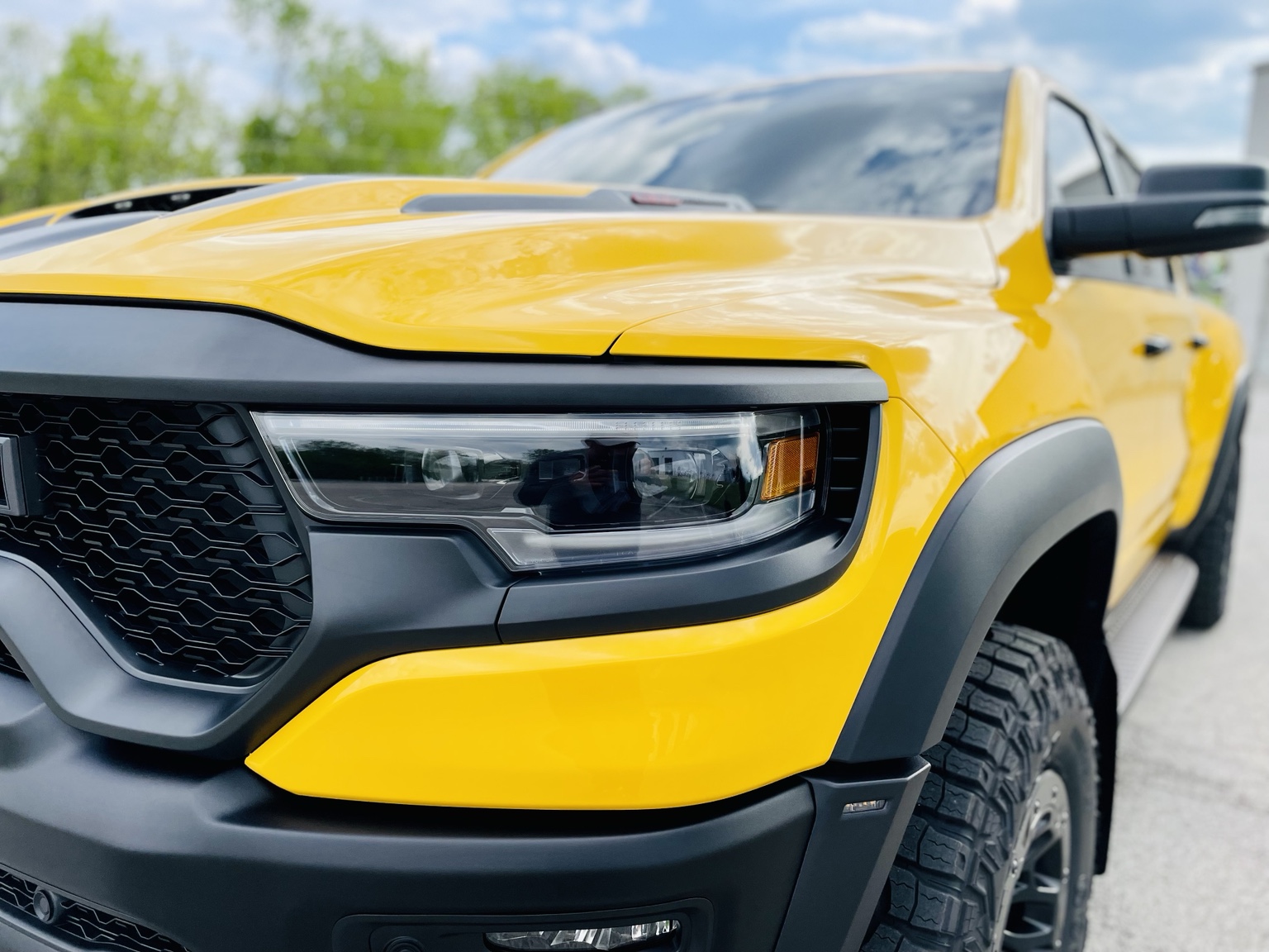 Yellow Ram TRX front end after Full Front paint protection film installation