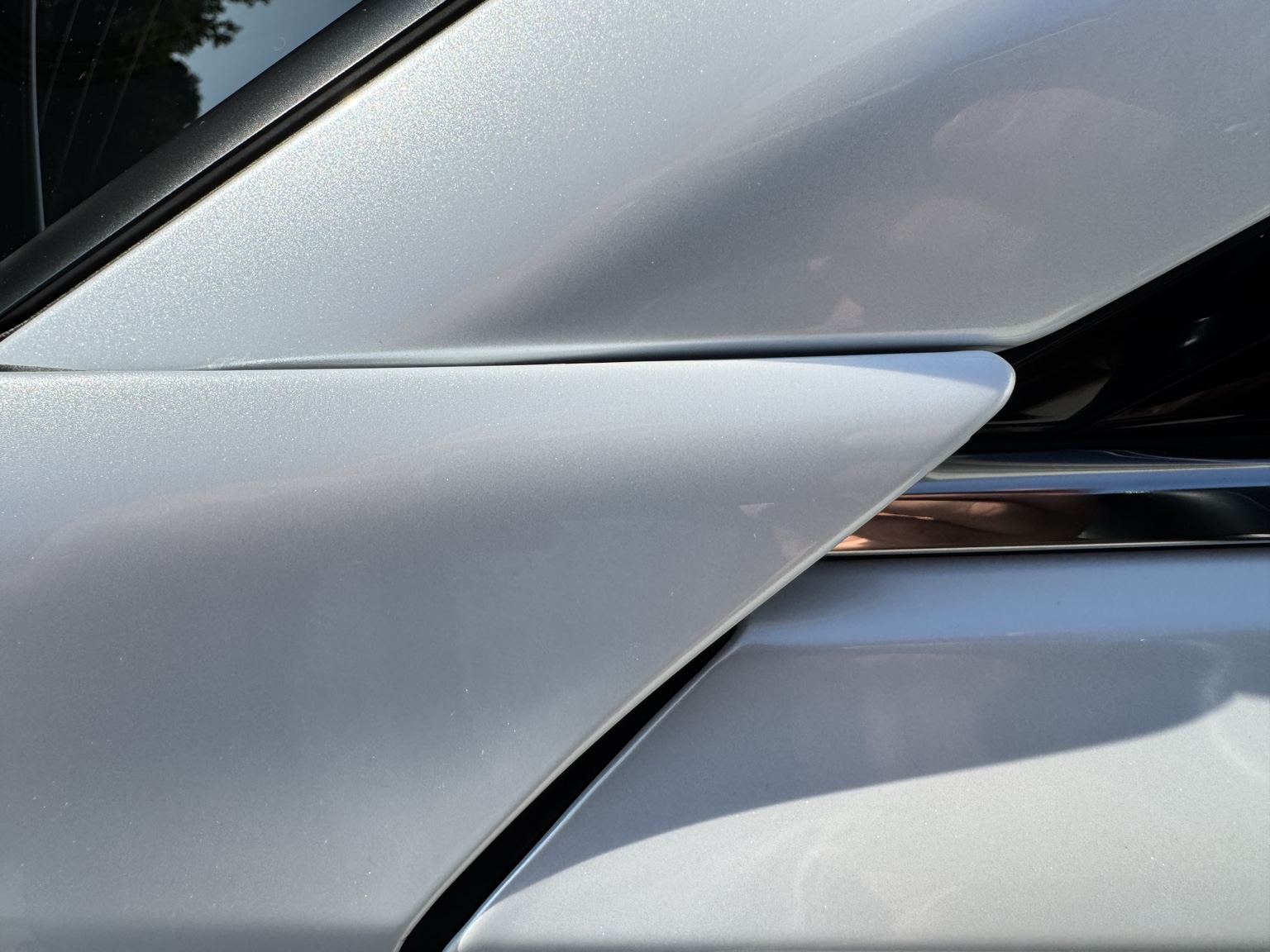 Close-up finish detail on protected Toyota Crown EV