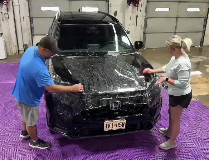 Owner-led paint protection film installation at STL Auto Defenders